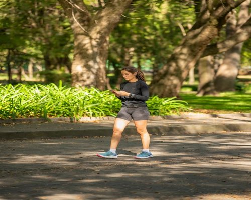 Active person enjoying a fresh morning walk near a park in Miraflores